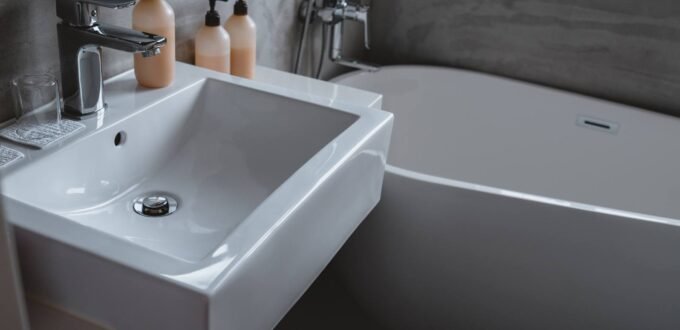 Bathroom fitter at work