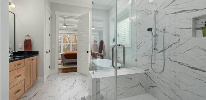 Finished bathroom with marble-effect tiles